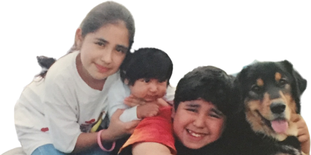 Giselle as a child with her dog Moses and brothers Sebastian and Pablo